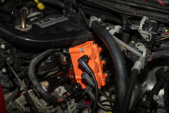 High-performance coil pack installed in an engine, showcasing seamless compatibility