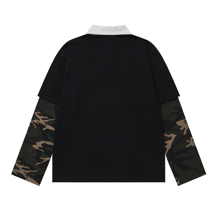 Back view of a black polo shirt with a light collar and long dark camouflage sleeves