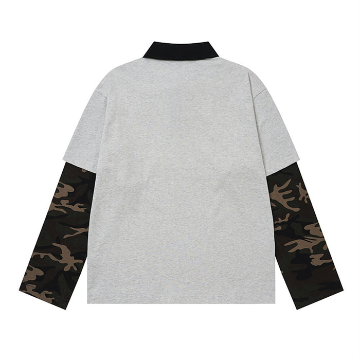 Back view of a gray polo shirt with black collar and long camouflage-patterned sleeves
