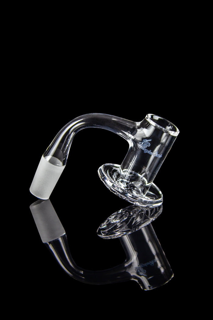 Clear glass dab rig with reflective surface.