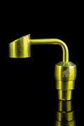 Close-up profile of a gold Honeybee Herb Titanium 2-In-1 Banger against a black background, showing the angled cup, curved neck, and reflective base.