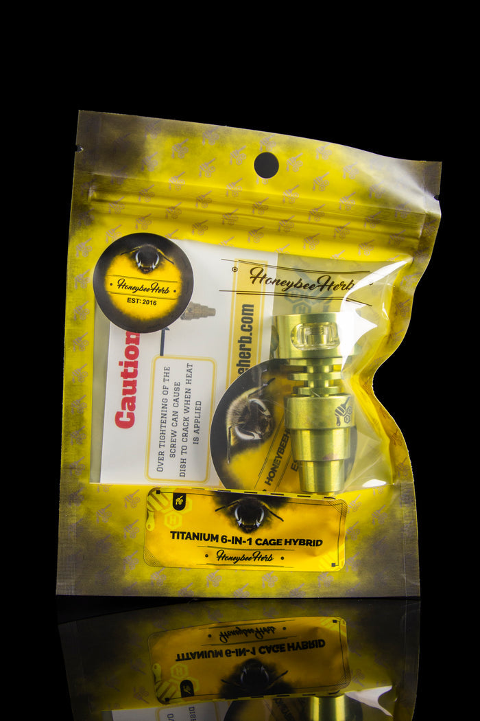 Yellow bag of Honeybee Herb titanium 6-in-1 cage hybrid cannabis accessory with caution text.