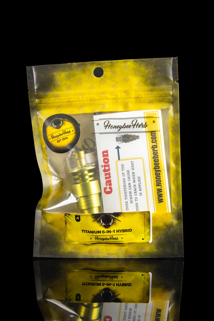 Yellow sealed bag for a “Titanium 6-in-1 Hybrid” smoking accessory with branding for “Honeybee Herb.”