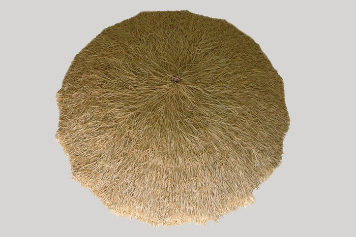 Hula 210cm Beach Umbrella with raffia thatch canopy and sand anchor for durable, tropical-style beach shade