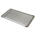 A stainless steel searing grate with parallel bars, intended for use on a grill.