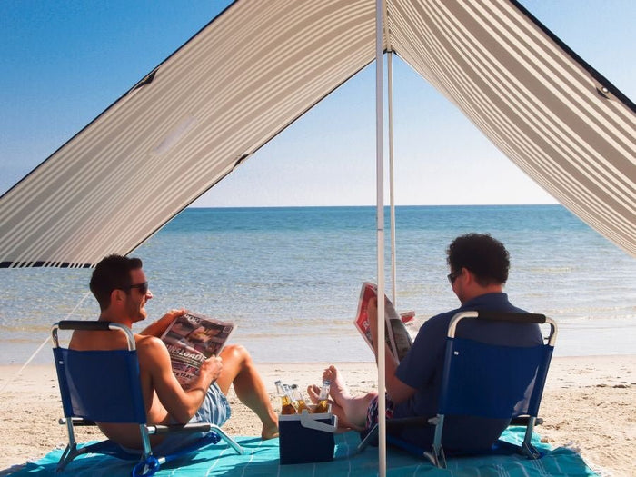 Lovin Summer beach shade tent providing UPF 40 sun protection with lightweight cotton canvas and large 6m² coverage on sand.