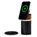 Duracell M150 charger with a phone wirelessly charging and the charging dock next to the charger