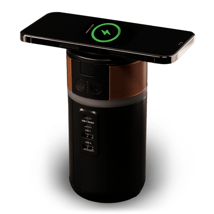Image of the power station with a phone wirelessly charging on top.