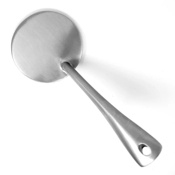 Stainless Steel meat flattener on a white background from a bird's eye view. The meat flattener is a disk of metal with a handle attached to it.