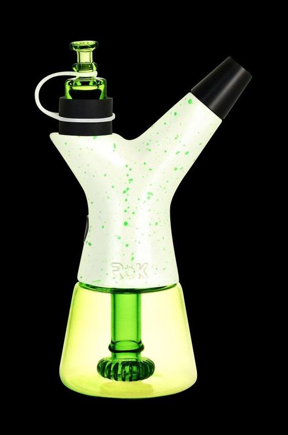 A speckled, translucent green and white rig with a black mouthpiece, used for vaporizing concentrates.