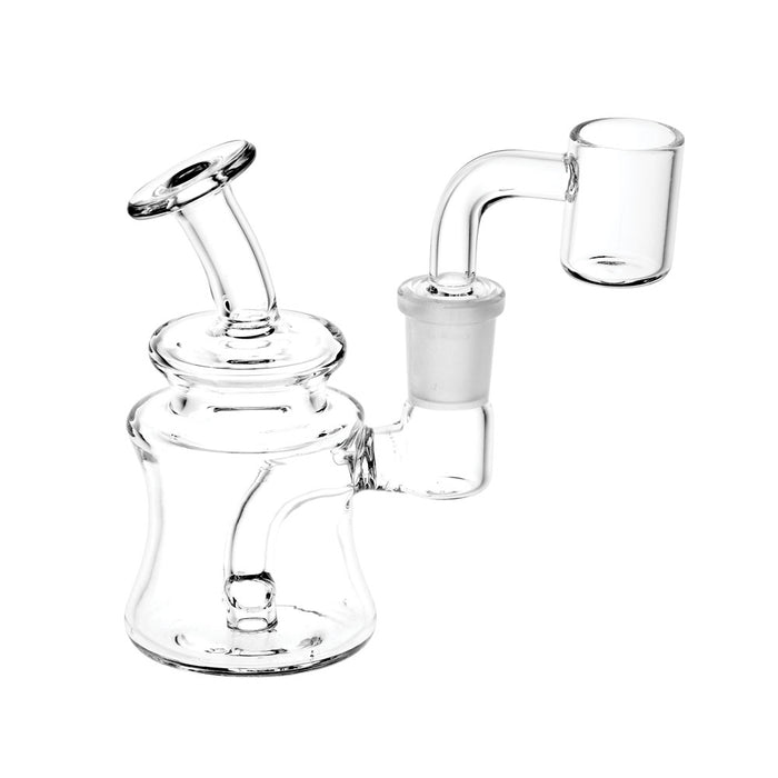 Clear glass dab rig with a quartz banger.