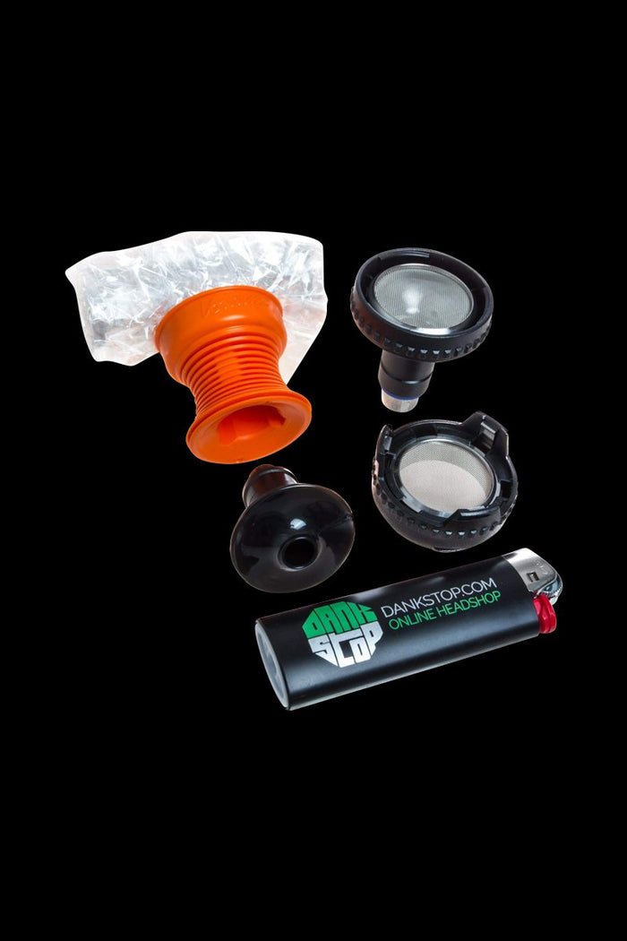 A close-up of the Storz & Bickel Volcano Easy Valve Starter Kit components, including a valve and gray connector, against a dark backdrop.
