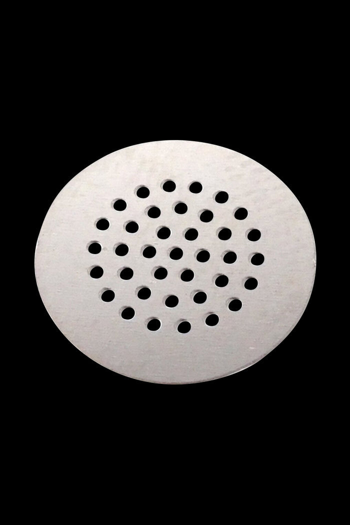 Close-up of the XVAPE Avant Ceramic Mouthpiece, showing a circular, textured surface against a dark background.